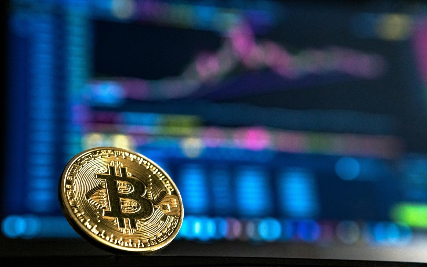 gold-colored Bitcoin by André François McKenzie courtesy of Unsplash.