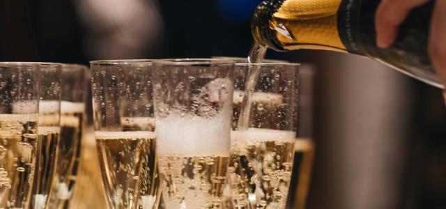 clear drinking glass with beer by Alexander Naglestad courtesy of Unsplash.